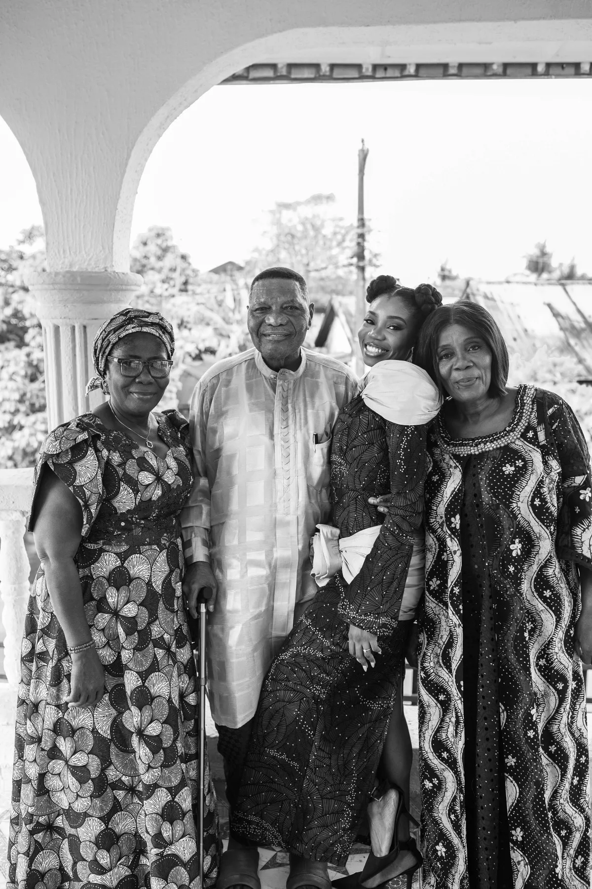 family group portrait on the veranda, black and white