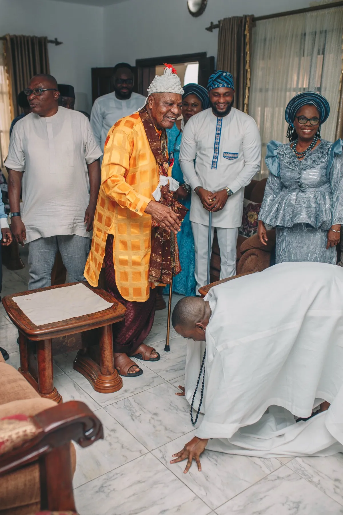 ekanem prostrating before the elders