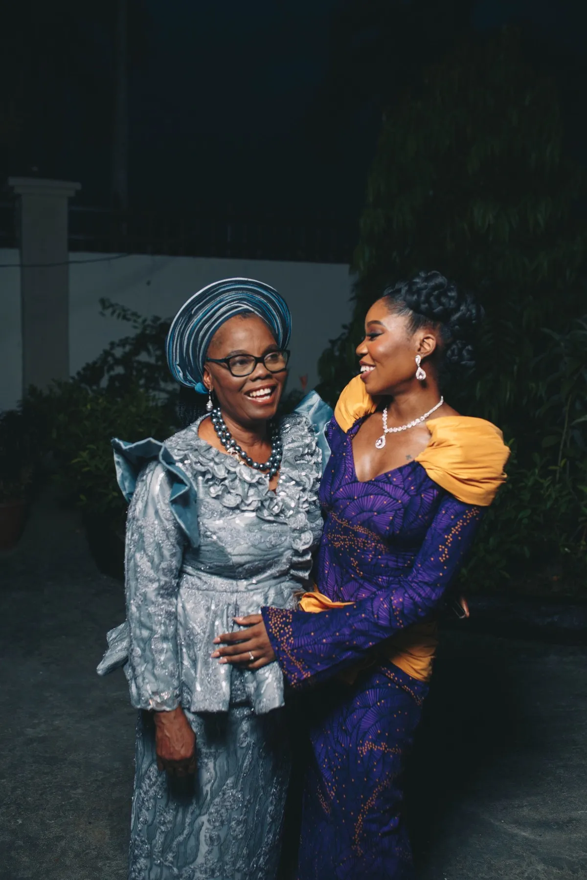 adeilé with a mother in a grey lace gele